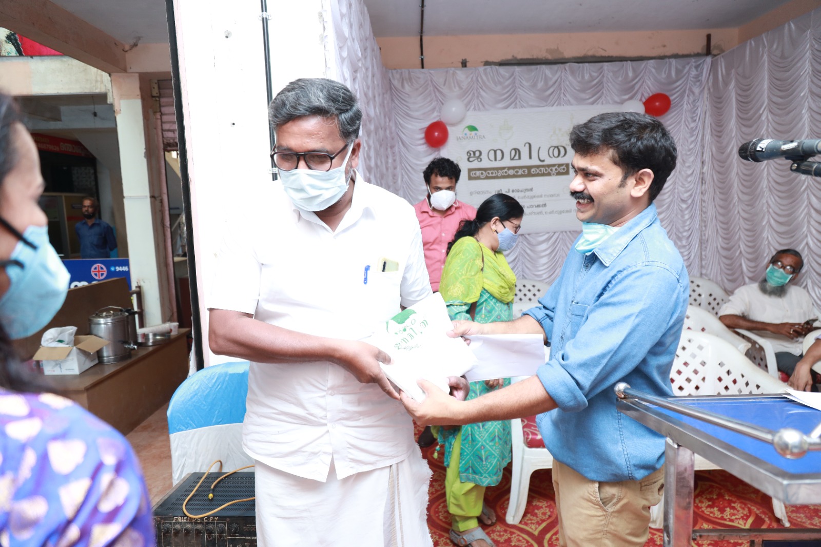 A memento being presented during the Janamitra Ayurveda Centre opening