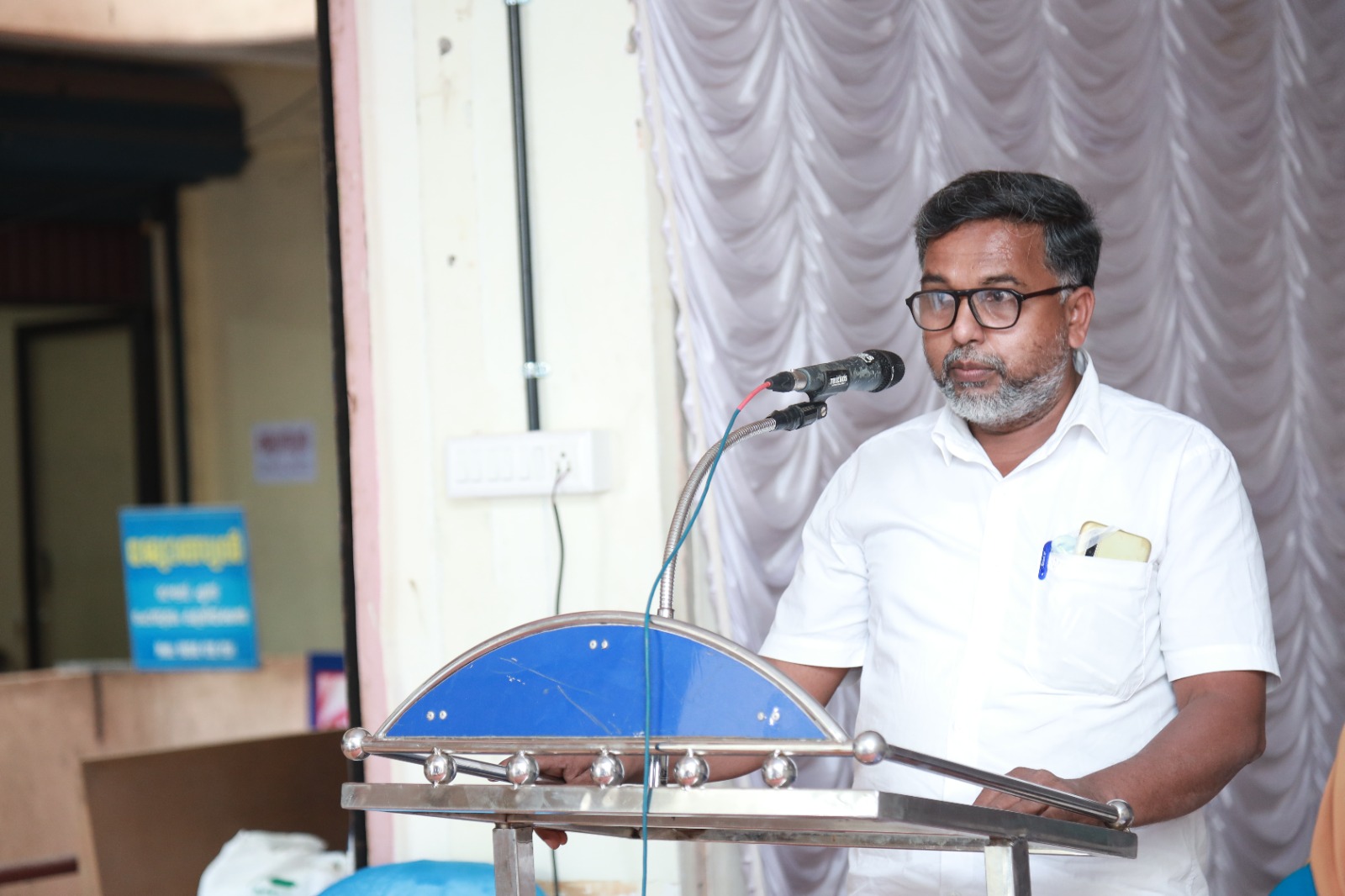 An address from the podium during the Janamitra Ayurveda Centre opening