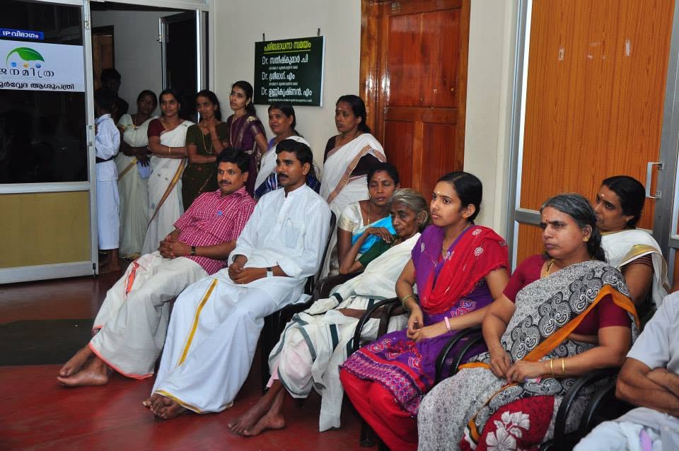 Guests seated together at a Janamitra community programme