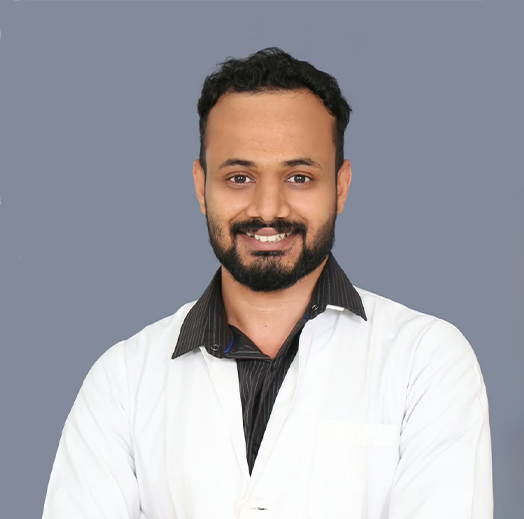 Portrait of Dr. Dinesh E